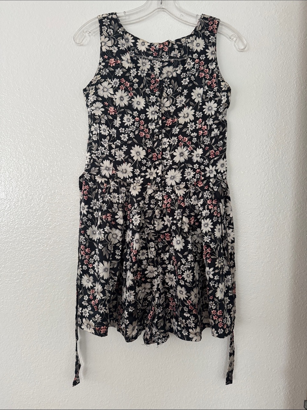 Women's Black Floral Sleeveless Romper with Tie Waist